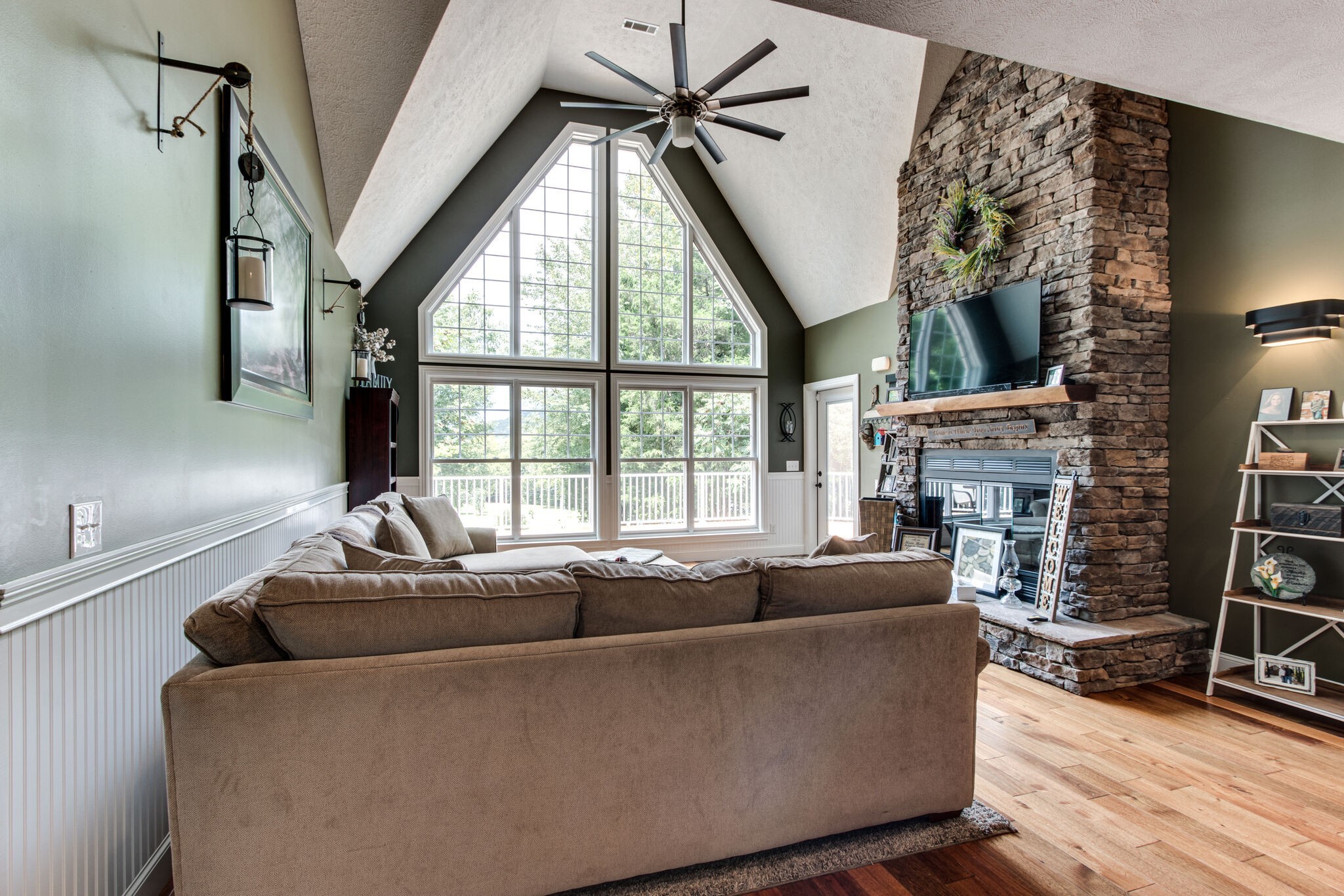67 Cedar Bend Road Beechgrove, TN 37018 - Photo 10 of 48 a living room with fireplace furniture and a large window