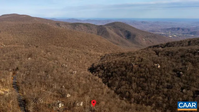 a view of mountains and valleys