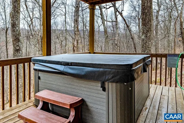a view of wooden balcony with a outdoor space