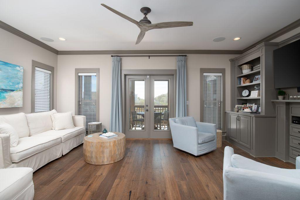 46 Eagles Landing Inlet Beach Inlet Beach, FL 32461 - Photo 15 of 40 a living room with furniture and a large window