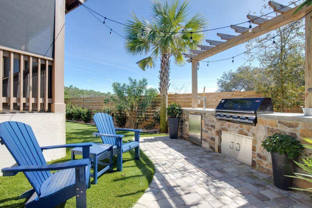 46 Eagles Landing Inlet Beach Inlet Beach, FL 32461 - Photo 23 of 40 a view of a chairs and table in the patio
