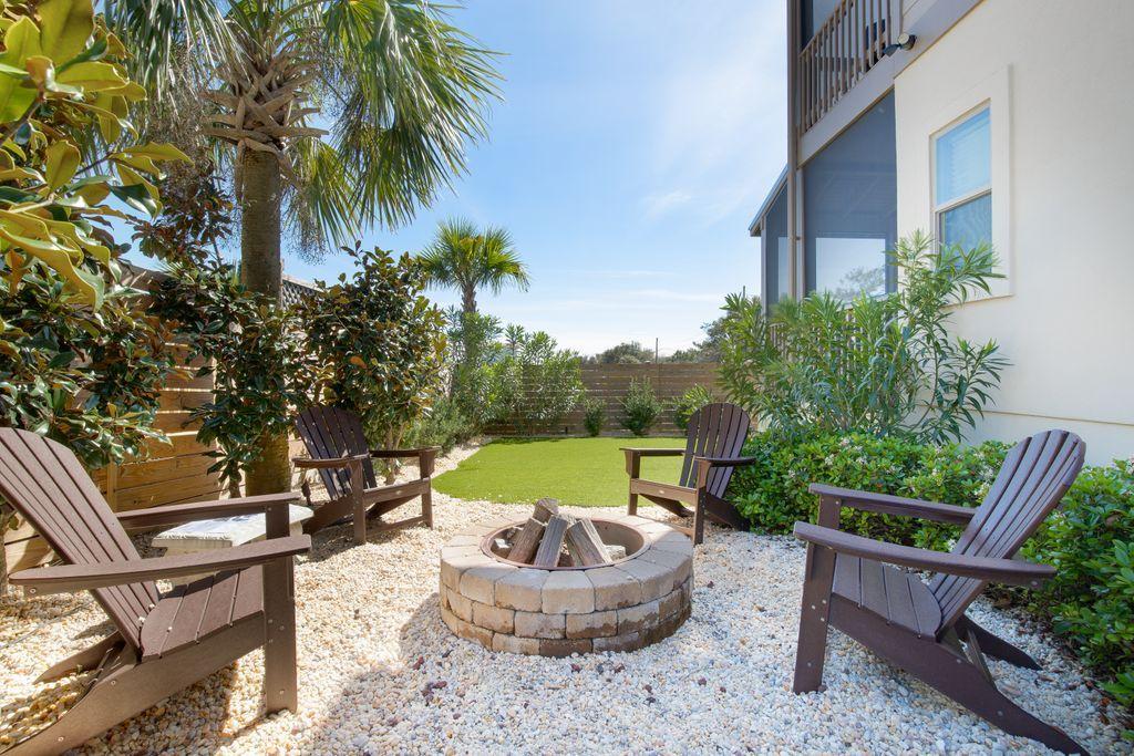 46 Eagles Landing Inlet Beach Inlet Beach, FL 32461 - Photo 24 of 40 a view of a patio with a chairs and table in the patio