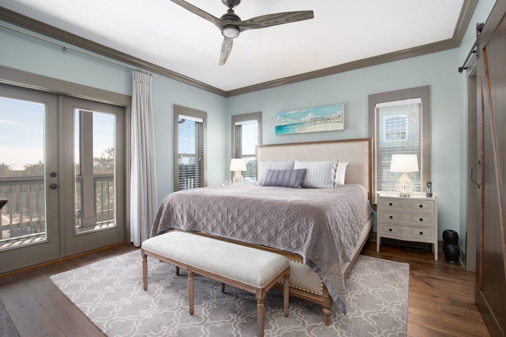46 Eagles Landing Inlet Beach Inlet Beach, FL 32461 - Photo 27 of 40 a bedroom with a bed and a large window
