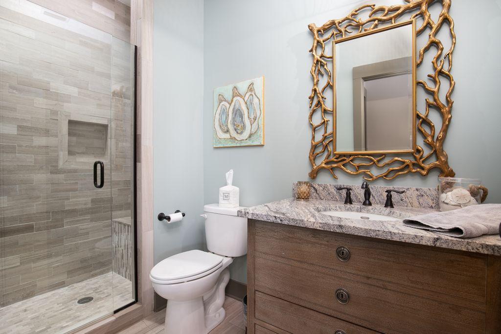 46 Eagles Landing Inlet Beach Inlet Beach, FL 32461 - Photo 33 of 40 a bathroom with a granite countertop sink mirror vanity and toilet
