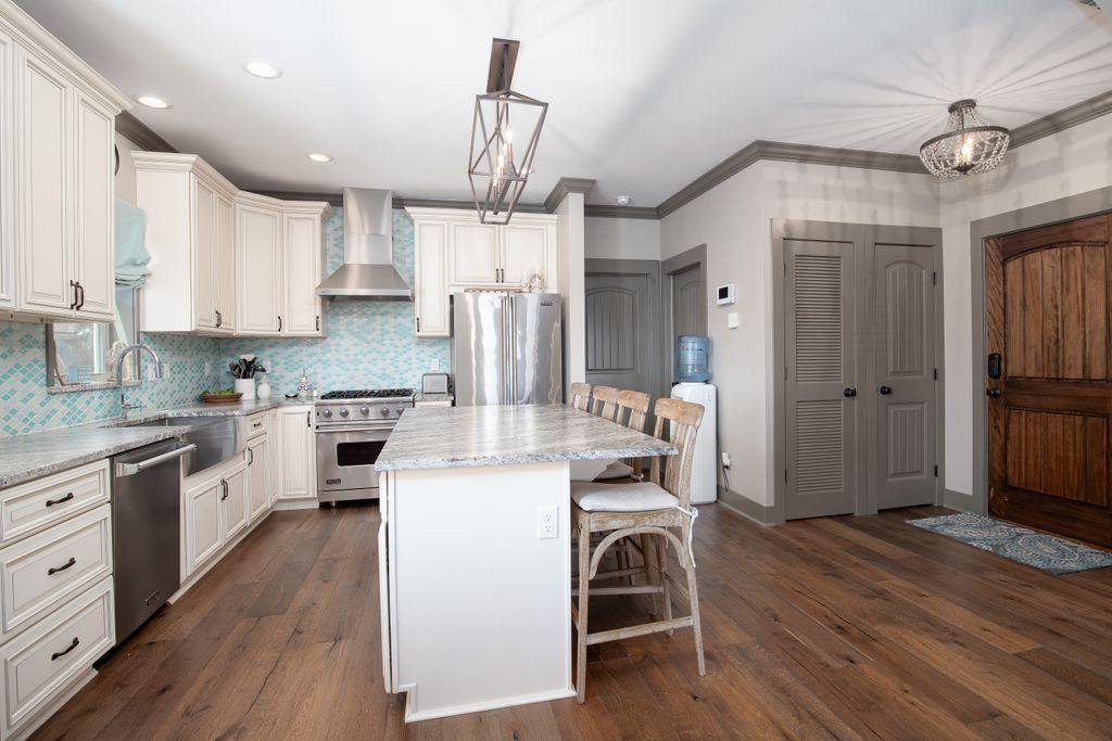46 Eagles Landing Inlet Beach Inlet Beach, FL 32461 - Photo 6 of 40 a kitchen with a stove a sink and a refrigerator