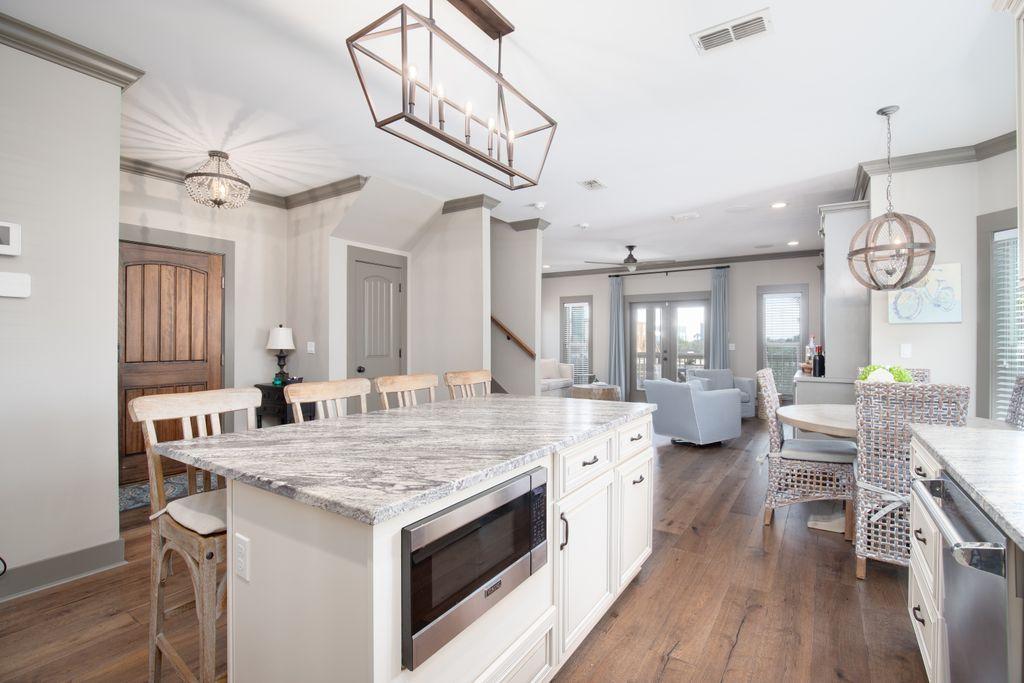 46 Eagles Landing Inlet Beach Inlet Beach, FL 32461 - Photo 7 of 40 a kitchen with a stove and a table