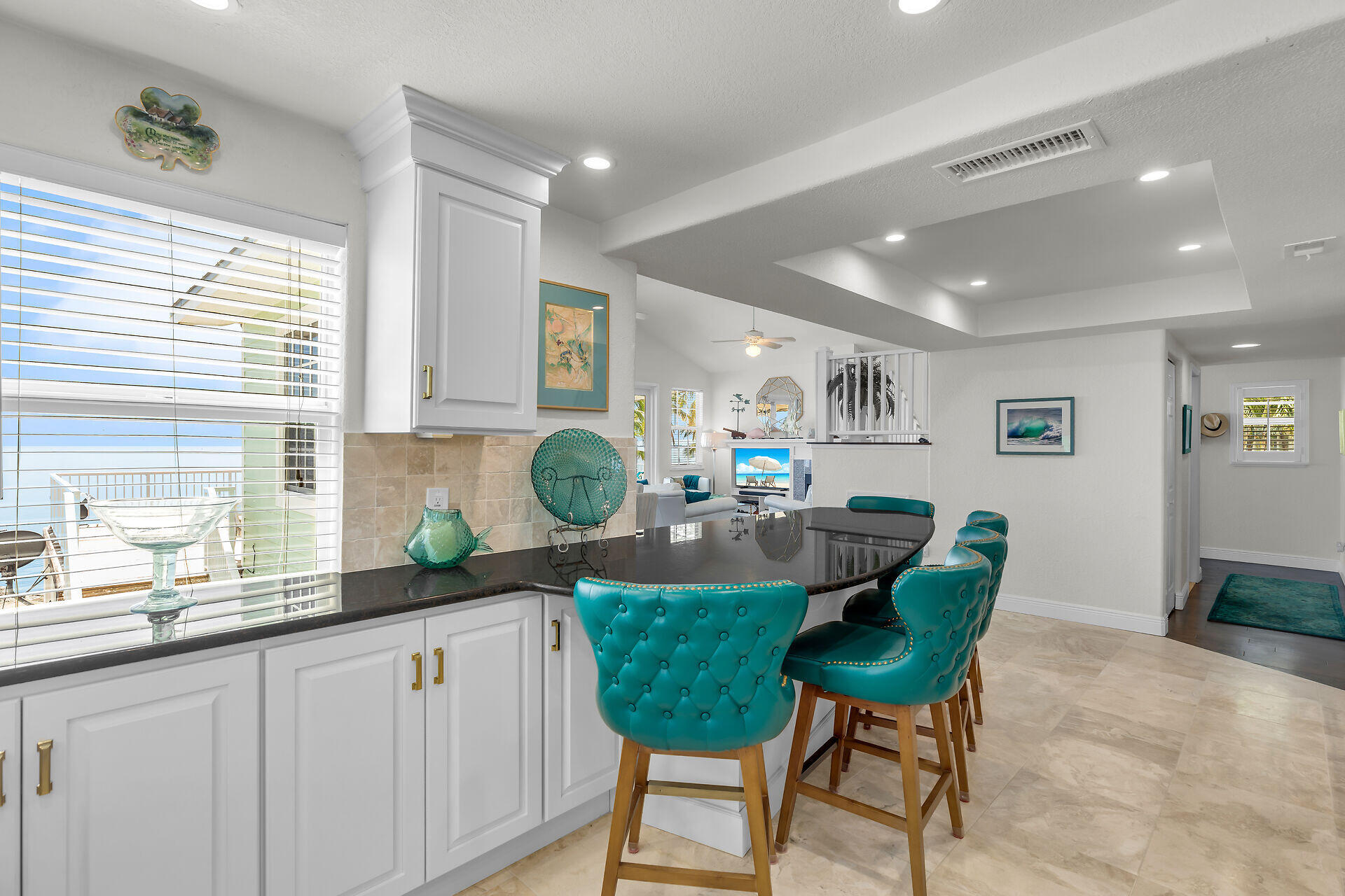 996 97th Street Marathon, FL 33050 - Photo 19 of 52 a kitchen with kitchen island granite countertop a sink and a large window