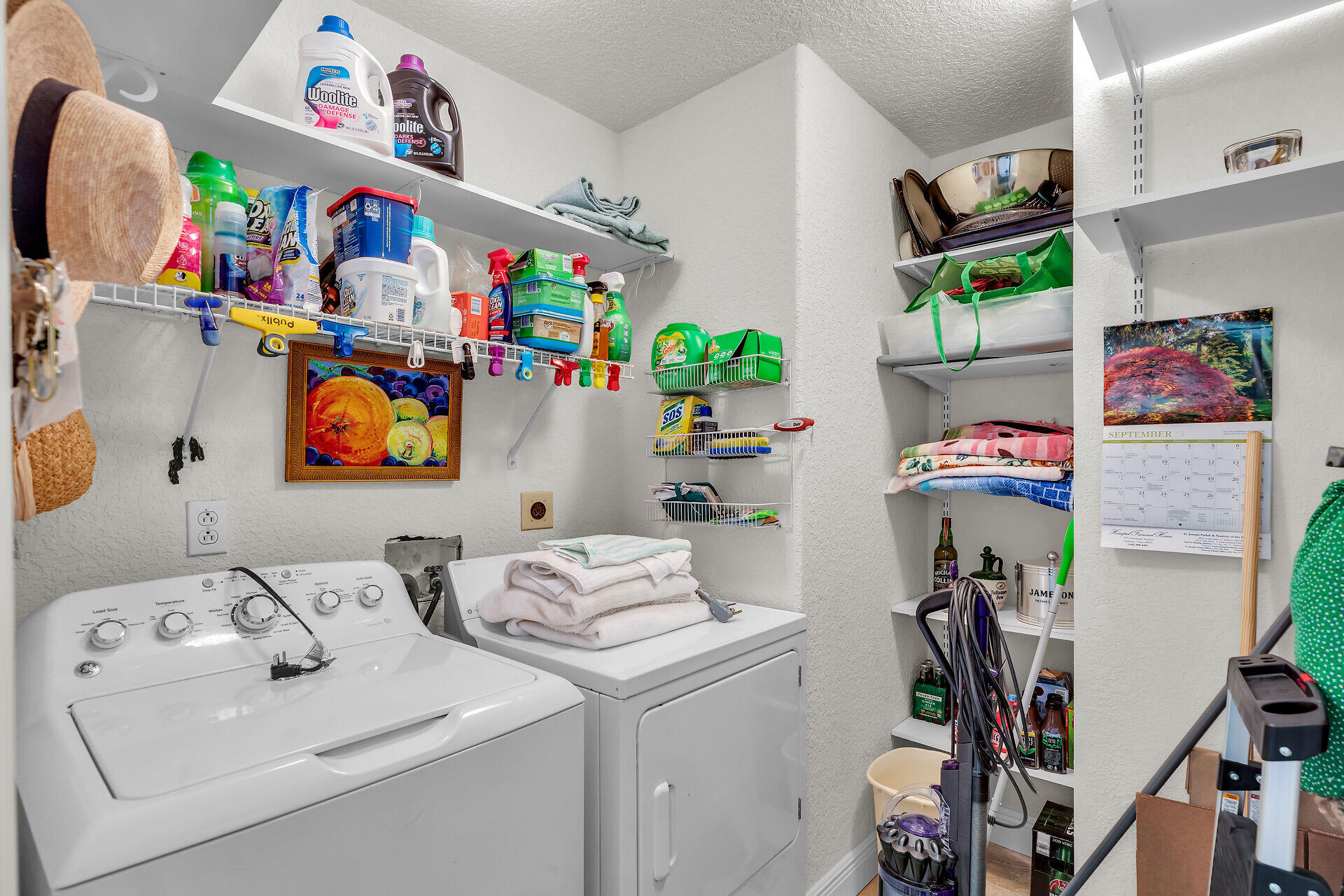 996 97th Street Marathon, FL 33050 - Photo 30 of 52 a utility room with fridge and a couch