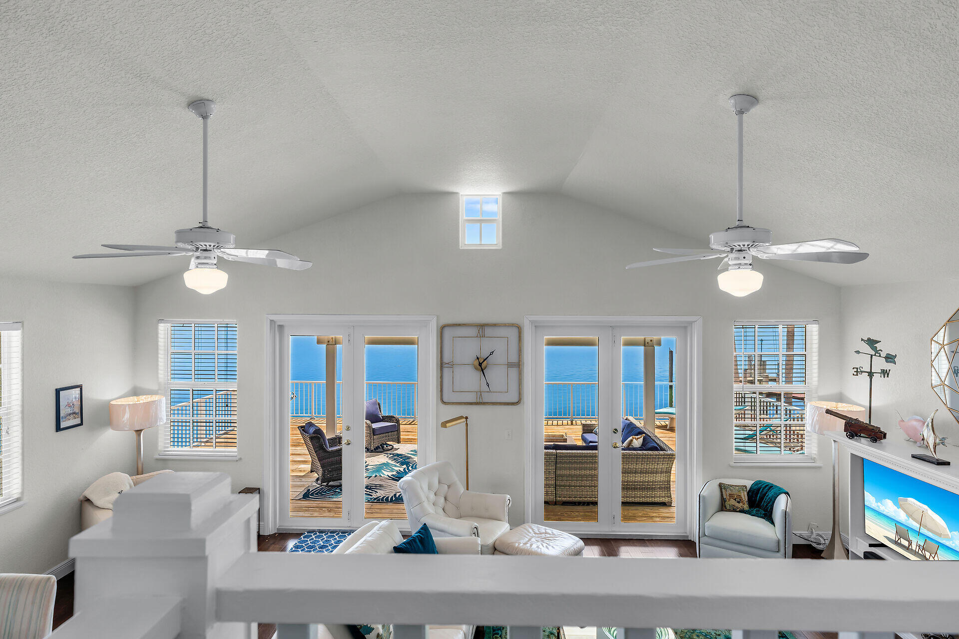 996 97th Street Marathon, FL 33050 - Photo 32 of 52 a view of a livingroom with furniture wooden floor and a chandelier