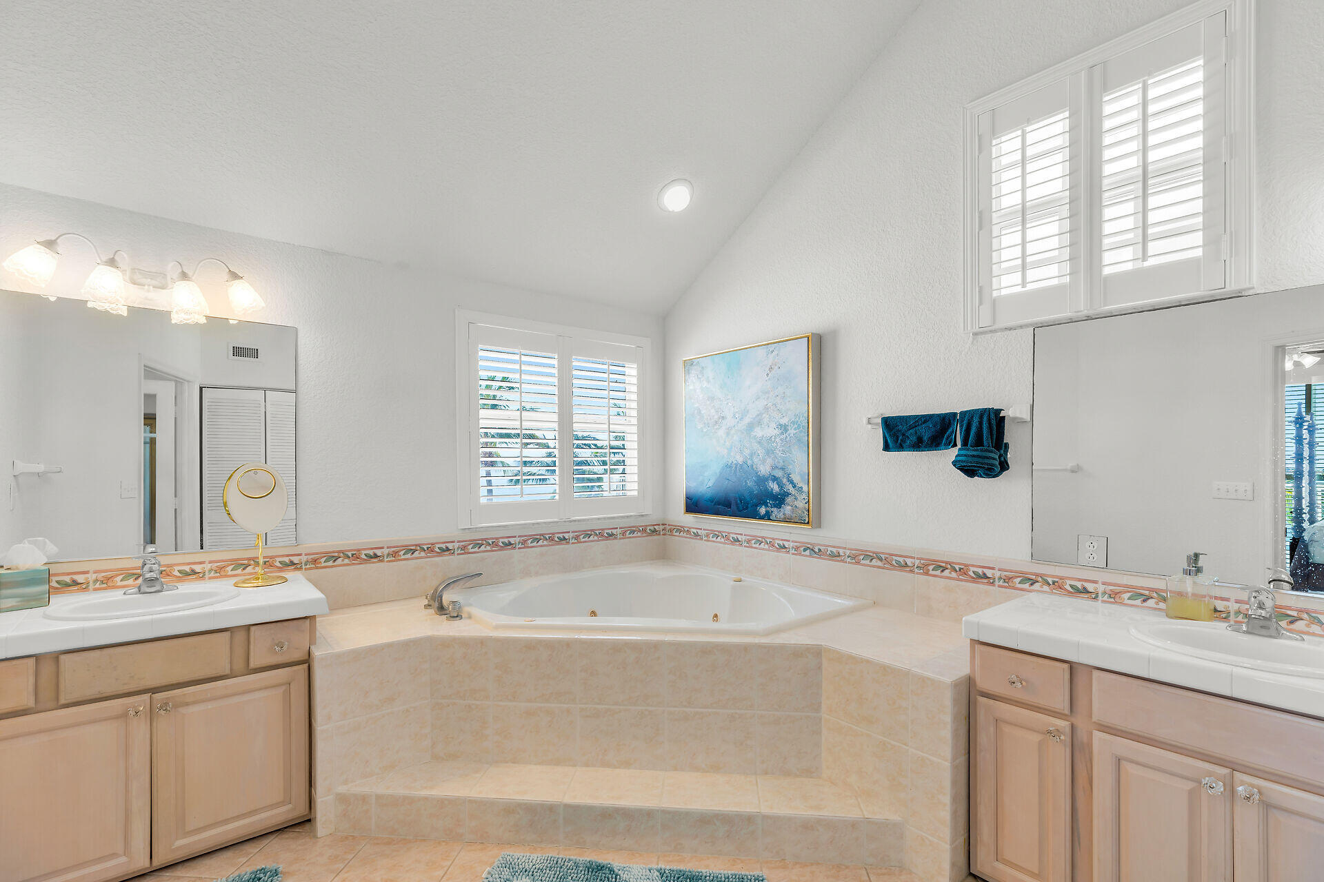 996 97th Street Marathon, FL 33050 - Photo 36 of 52 a bathroom with a granite countertop tub sink and mirror