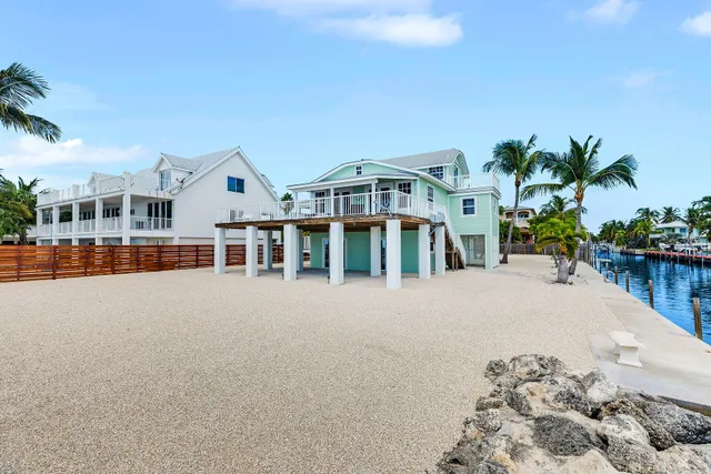 a view of a house with a swimming pool