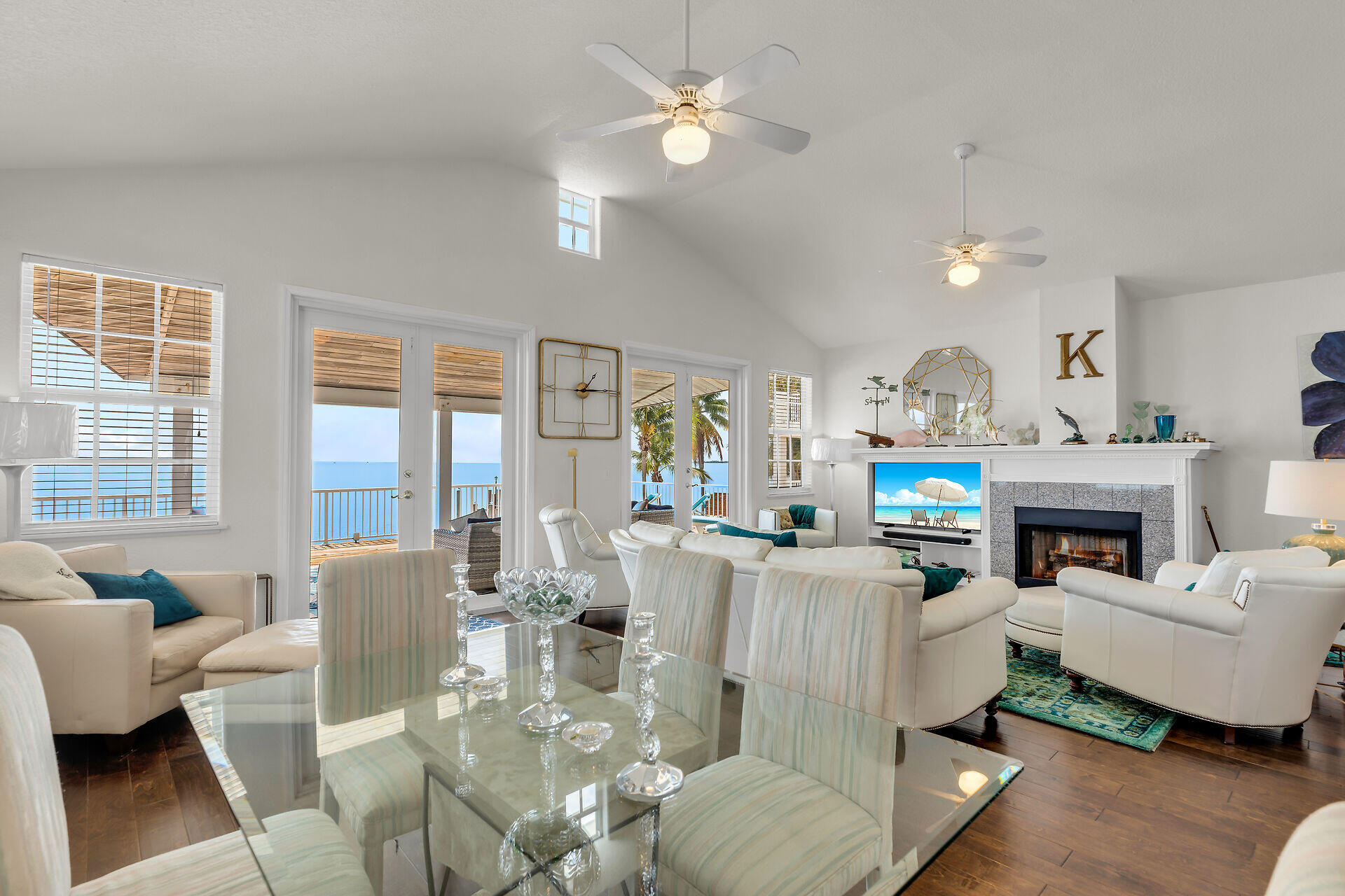 996 97th Street Marathon, FL 33050 - Photo 10 of 52 a living room with furniture a fireplace and a chandelier