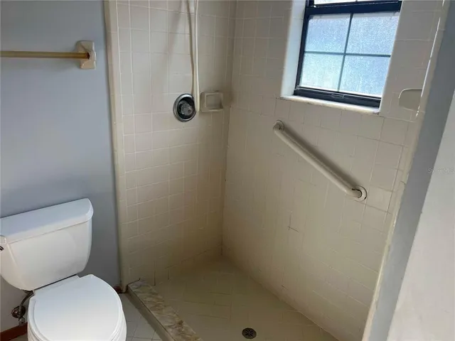 a bathroom with a toilet and a sink