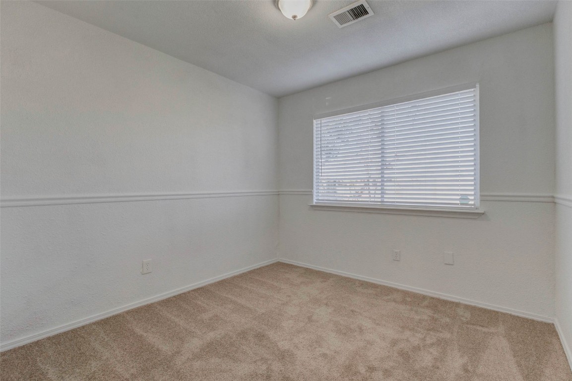5210 Shirley Street Baytown, TX 77521 - Photo 20 of 31 an empty room with a window