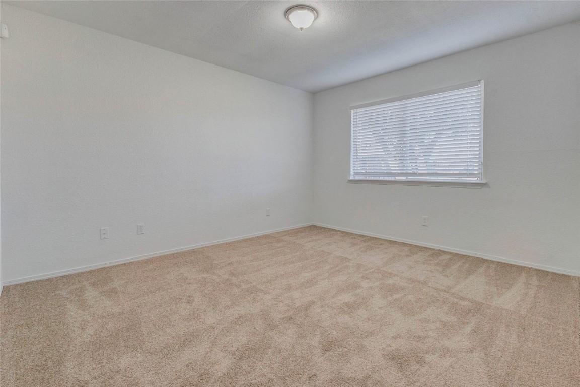 5210 Shirley Street Baytown, TX 77521 - Photo 22 of 31 an empty room with a window