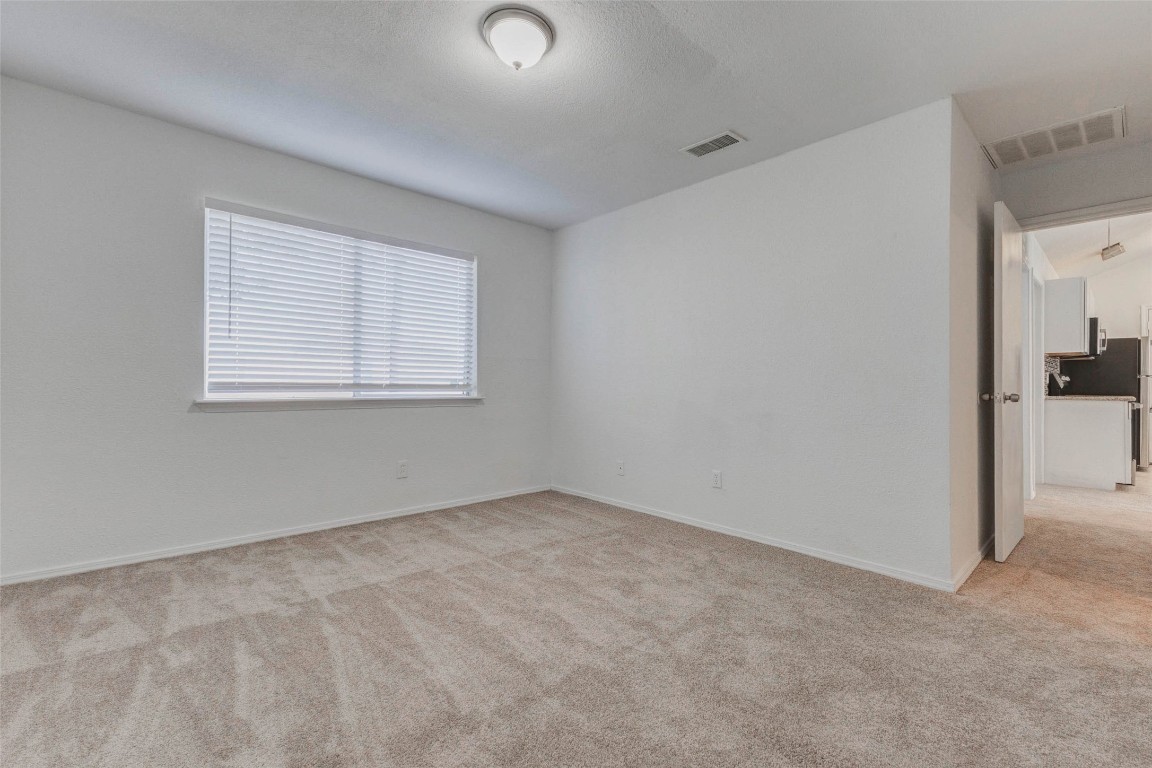 5210 Shirley Street Baytown, TX 77521 - Photo 24 of 31 an empty room with windows