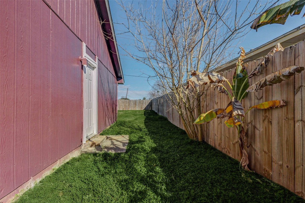 5210 Shirley Street Baytown, TX 77521 - Photo 27 of 31 a view of a pathway of a building