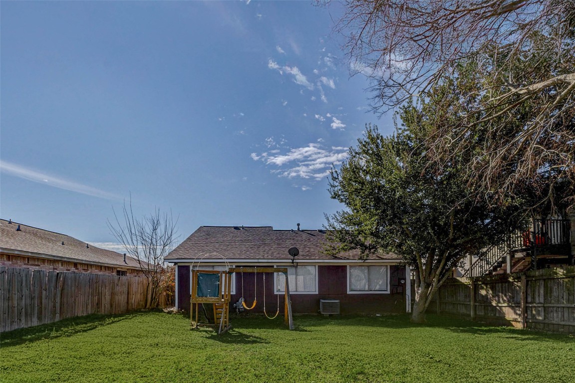 5210 Shirley Street Baytown, TX 77521 - Photo 29 of 31 a view of a yard in front of a house
