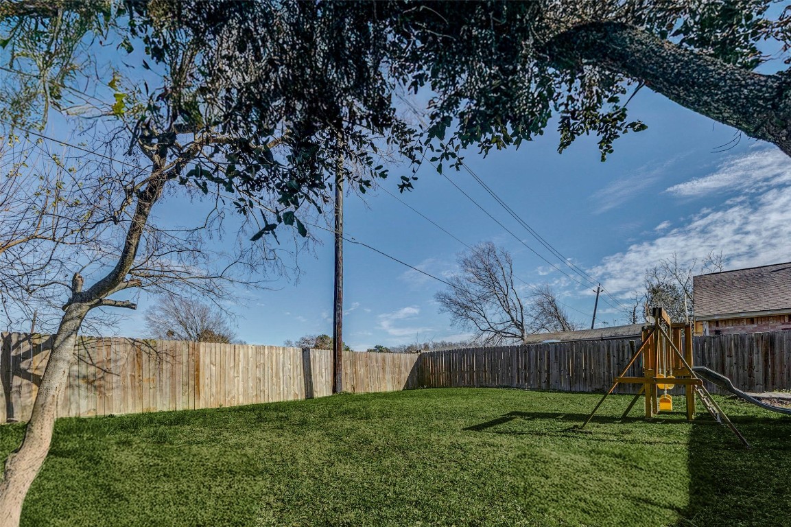 5210 Shirley Street Baytown, TX 77521 - Photo 31 of 31 a view of yard with green space