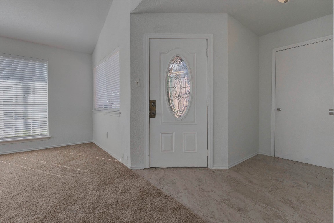 5210 Shirley Street Baytown, TX 77521 - Photo 5 of 31 an empty room with window