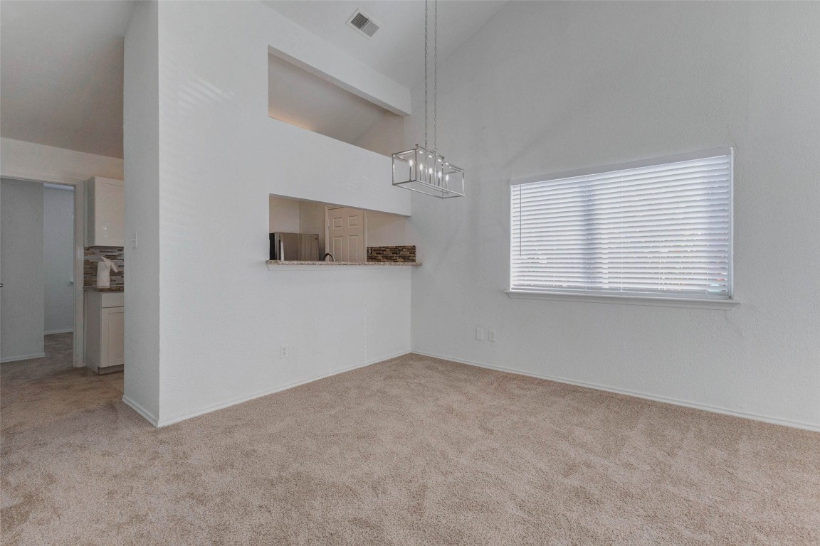 5210 Shirley Street Baytown, TX 77521 - Photo 9 of 31 an empty room with windows