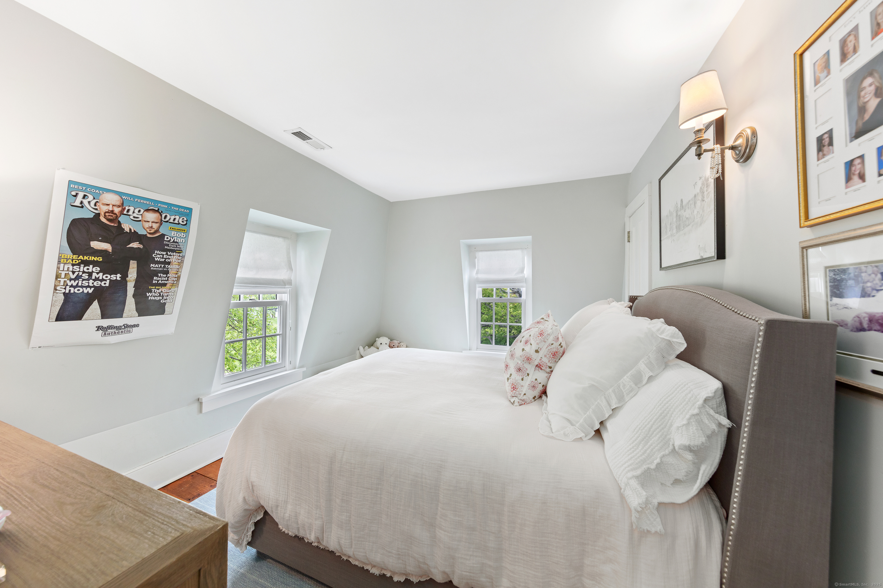 168 Rowayton Avenue Norwalk, CT 06853 - Photo 18 of 27 a bedroom with a bed and a window