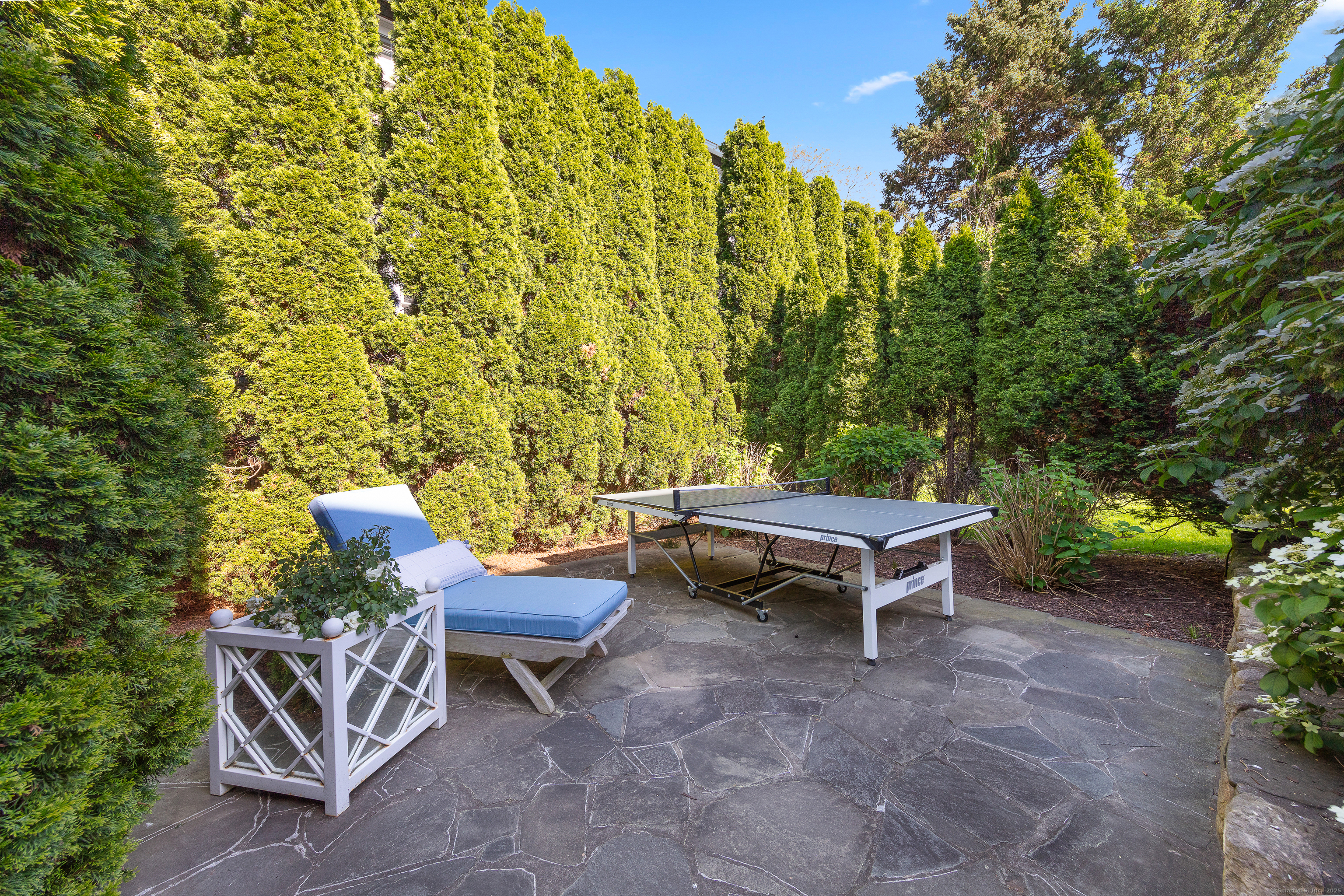 168 Rowayton Avenue Norwalk, CT 06853 - Photo 20 of 27 a garden view with a seating space