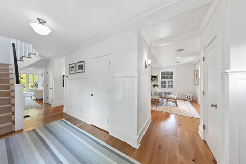 a view of a living room and dining room
