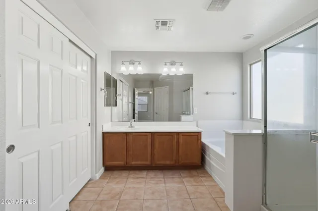 a view of an empty walk in closet