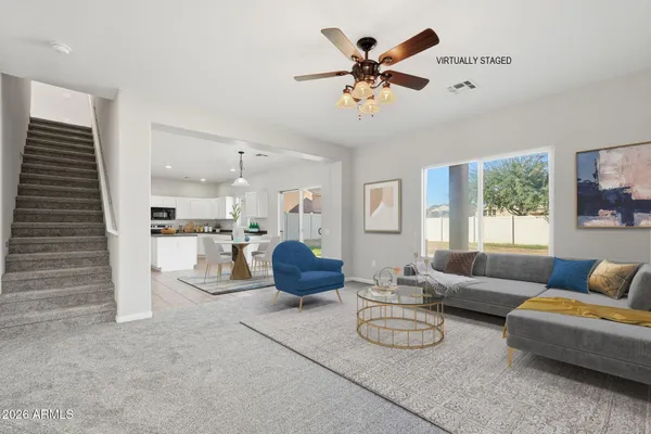 a view of a kitchen with a sink and a stove