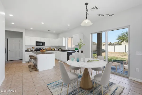a view of a kitchen with a sink cabinets and a window