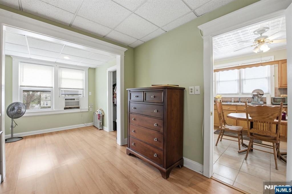 110 Tappan Street Kearny, NJ 07032 - Photo 6 of 13 a view of a livingroom with furniture hardwood and windows