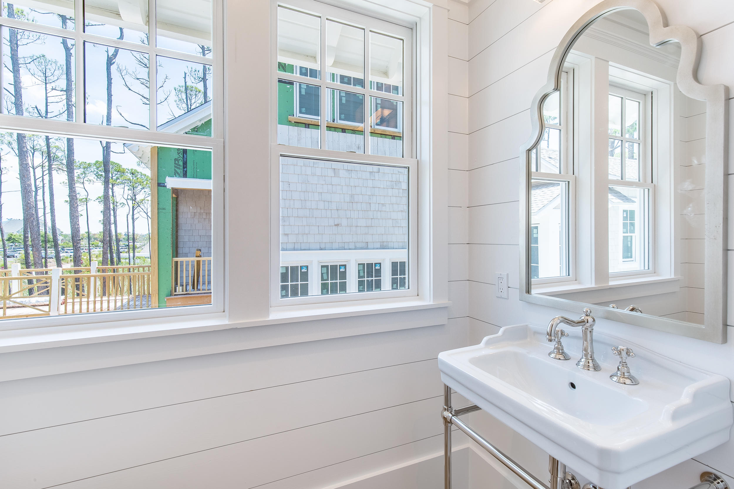 Lot 50 South Compass Point Way Watersound, FL 32461 - Photo 51 of 89 a bathroom with a sink and a window