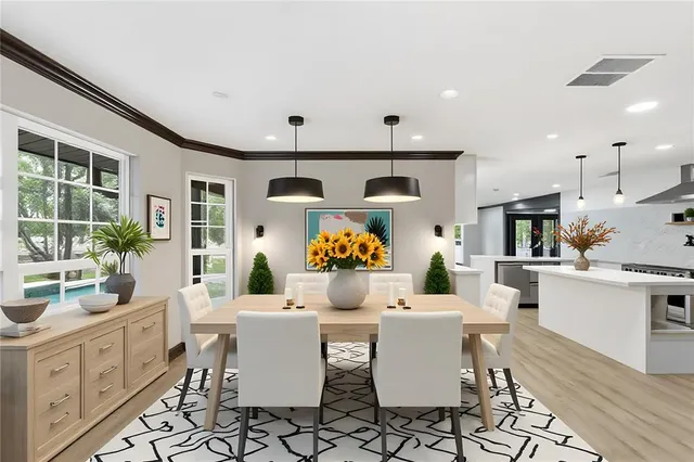 a stove top oven sitting inside of a kitchen