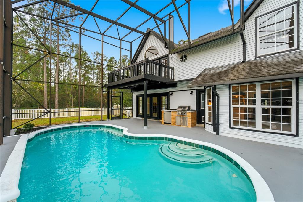 14728 Henson Road Orlando, FL 32832 - Photo 43 of 70 a view of a house with a swimming pool