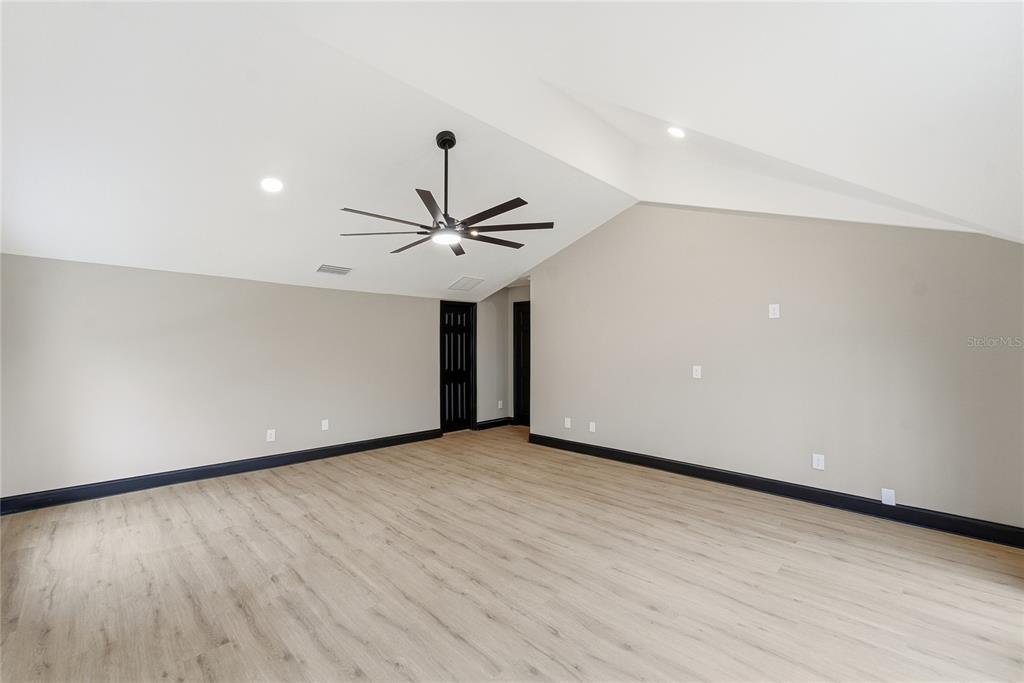 14728 Henson Road Orlando, FL 32832 - Photo 48 of 70 wooden floor in an empty room with a window