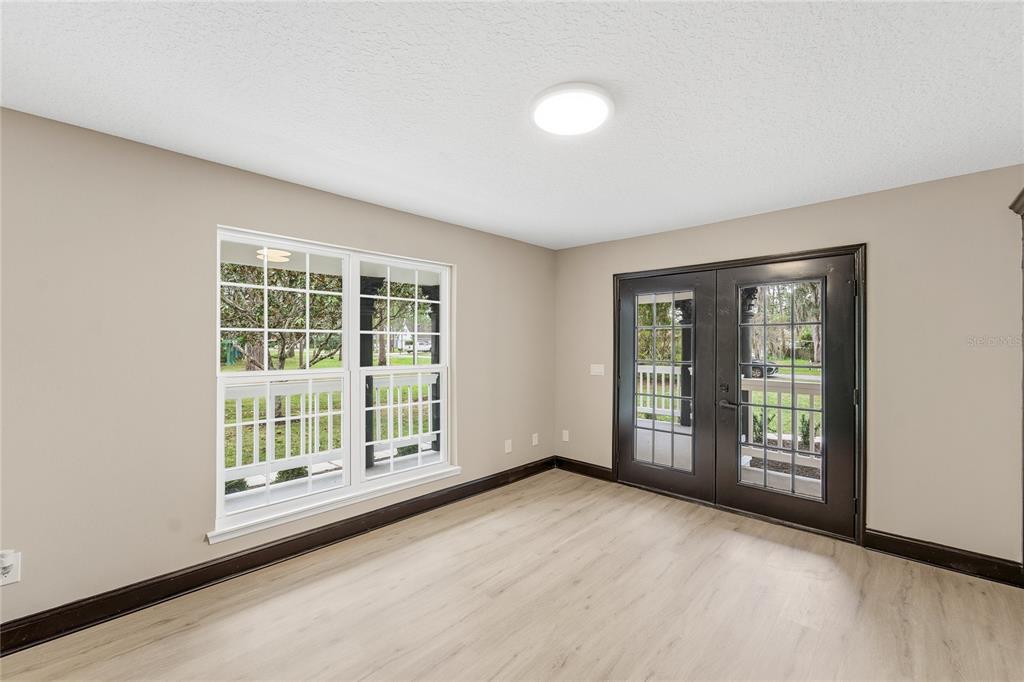 14728 Henson Road Orlando, FL 32832 - Photo 10 of 70 a view of an empty room with a window