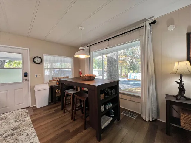 a bathroom with a sink a toilet and a shower