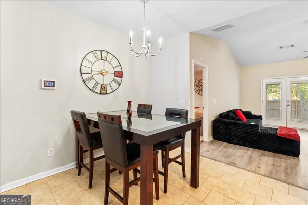a view of a dining room with furniture