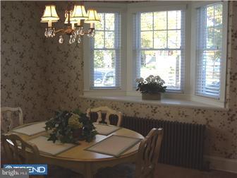 320 Lippincott Avenue Riverside, NJ 08075 - Photo 4 of 12 a dining table with next to a window