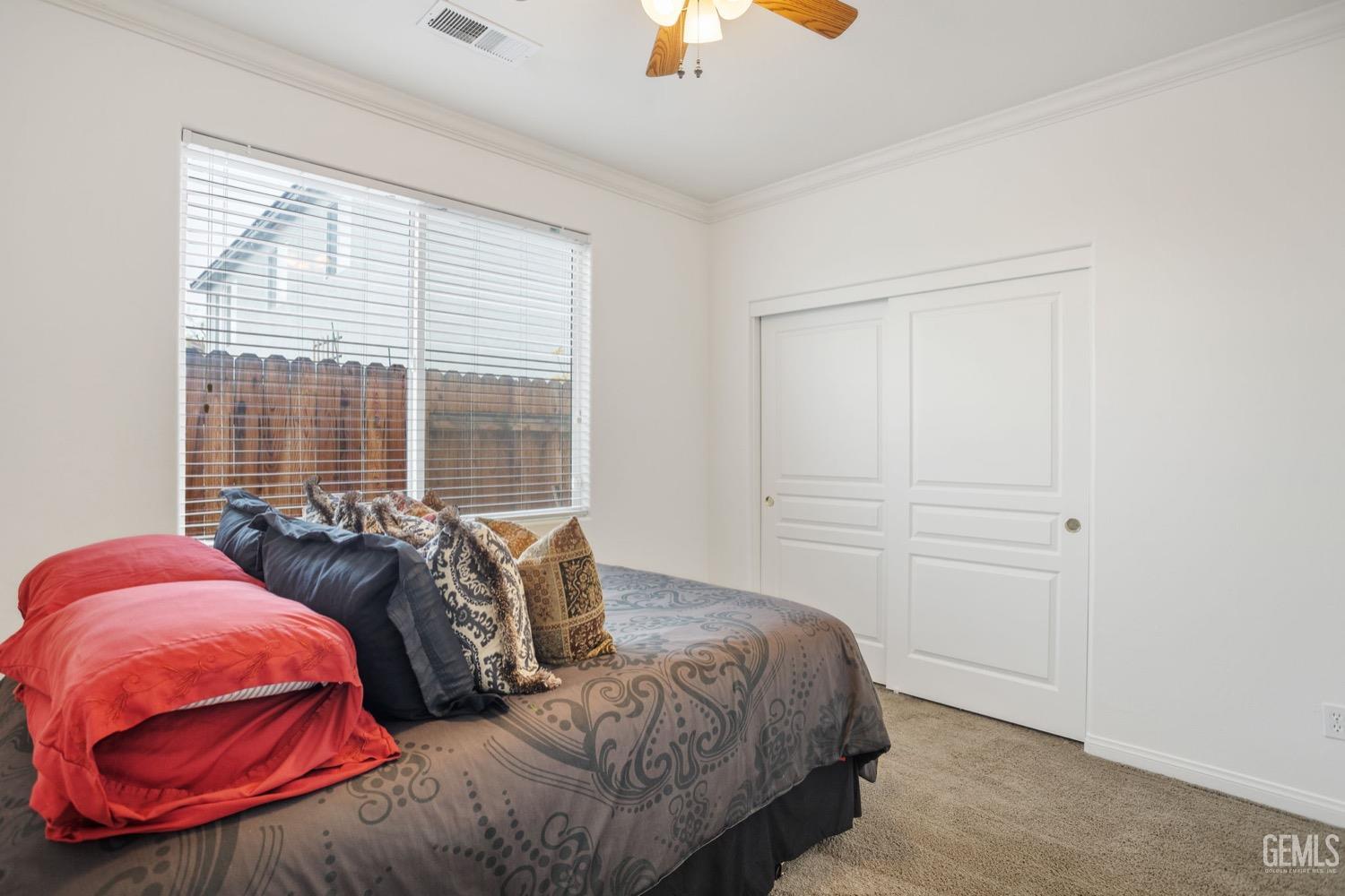 Undisclosed Address Bakersfield, CA 93312 - Photo 39 of 45 a bedroom with a bed and window