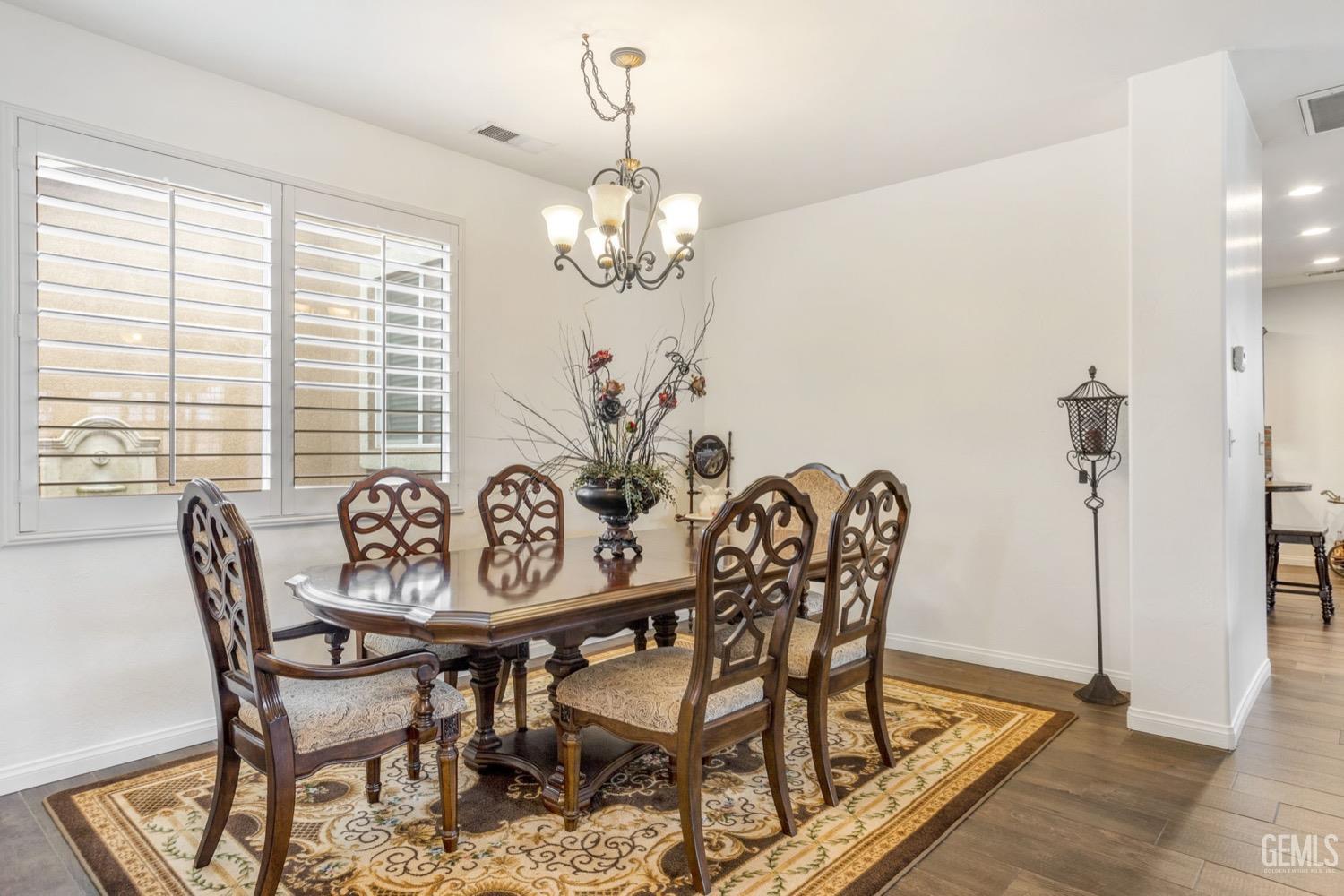 Undisclosed Address Bakersfield, CA 93312 - Photo 9 of 45 a view of a dining room with furniture window and outside view