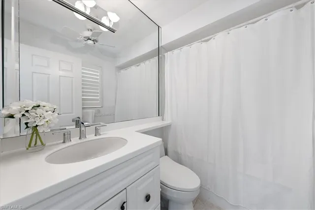 a view of a house with pool and wooden floor