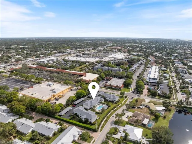 an aerial view of a city with lots of residential buildings