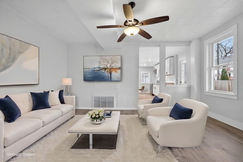 77 Off Hamilton Street Southbridge, MA 01550 - Photo 12 of 42 a living room with furniture and a wooden floor