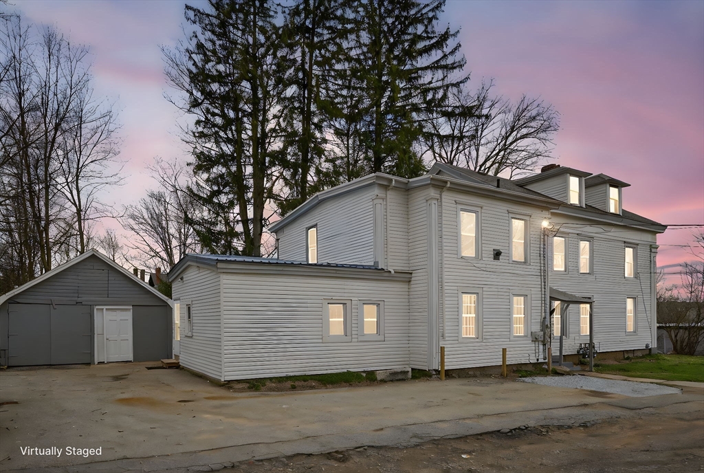 77 Off Hamilton Street Southbridge, MA 01550 - Photo 2 of 42 a front view of a house with a yard