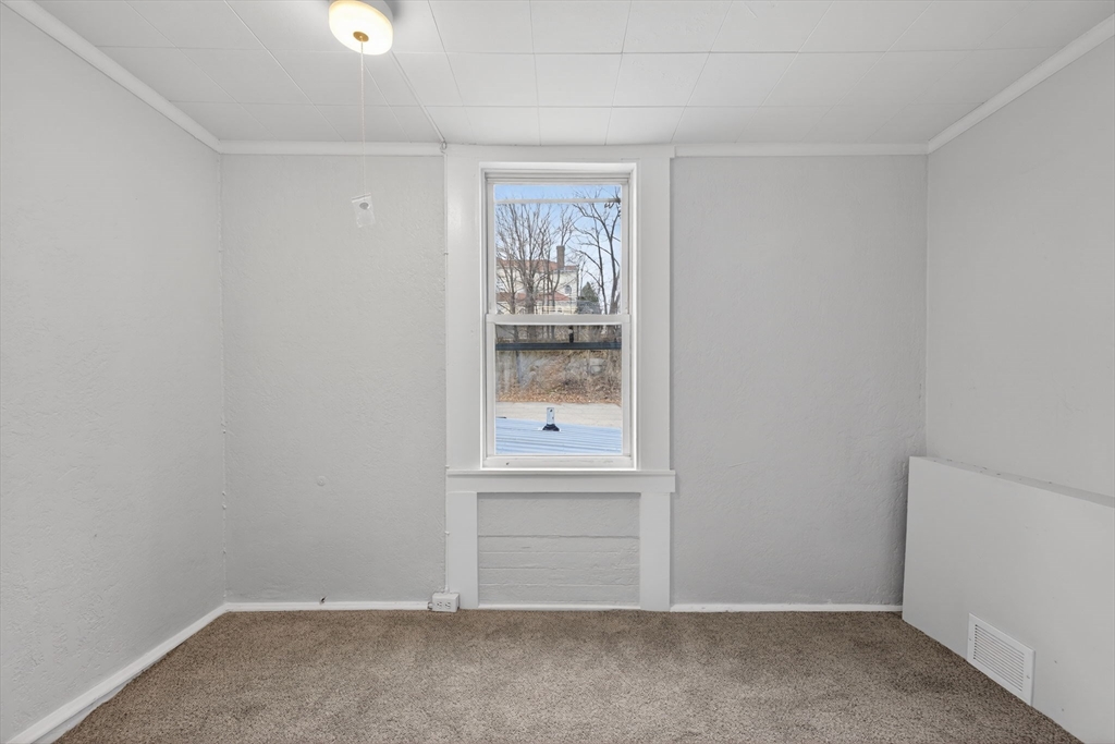 77 Off Hamilton Street Southbridge, MA 01550 - Photo 24 of 42 an empty room with windows