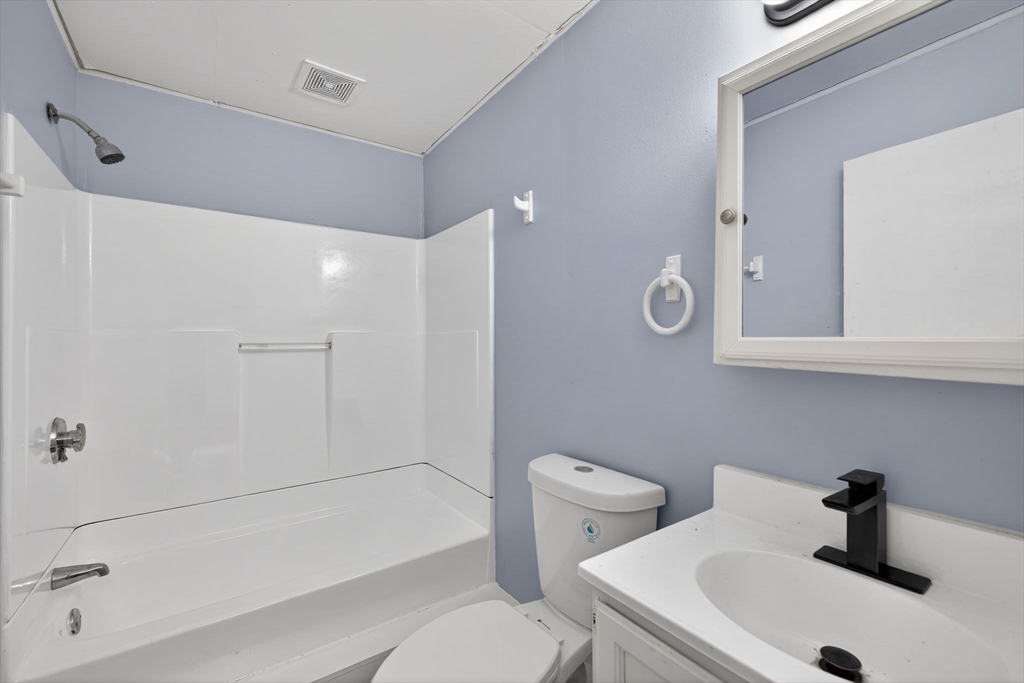 77 Off Hamilton Street Southbridge, MA 01550 - Photo 25 of 42 a bathroom with a sink a toilet and shower