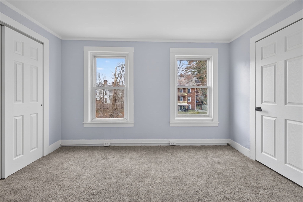 77 Off Hamilton Street Southbridge, MA 01550 - Photo 28 of 42 an empty room with windows