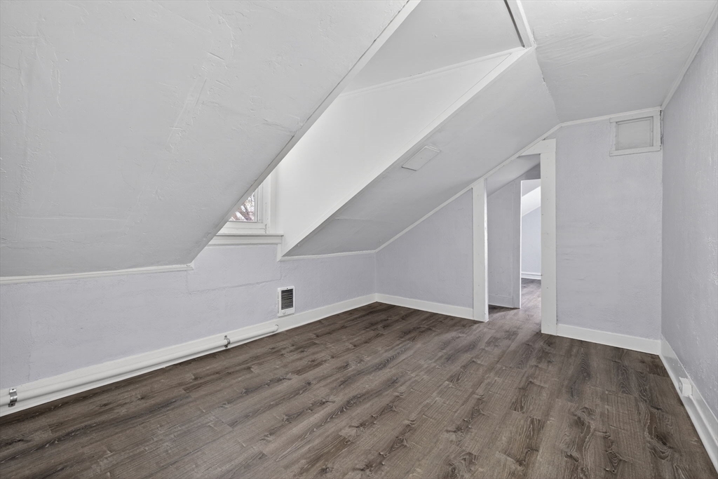 77 Off Hamilton Street Southbridge, MA 01550 - Photo 37 of 42 a view of an empty room with wooden floor